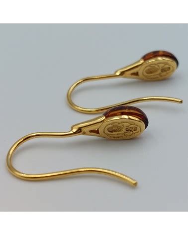 Boucle d oreilles en Ambre couleur cognac avec en argent 925 doré