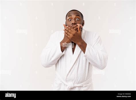 Portrait Of Excited Young African American Male Screaming In Shock And