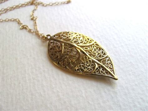 Golden Filigree Leaf Charm Necklace On Long Delicate 14k Gold