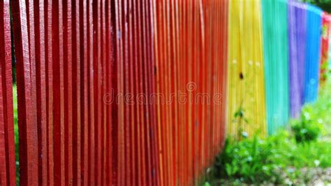 Detail And Closeup View Of A Colorful Wooden Fence In Different Colors