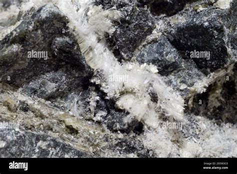 White fibers of asbestos mineral in stone, close-up Stock Photo - Alamy