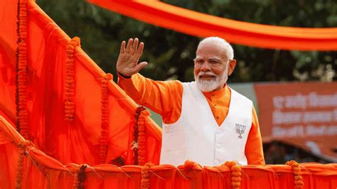 Lok Sabha Polls Pm Modi Holds Mega Roadshow In Varanasi A Day Before