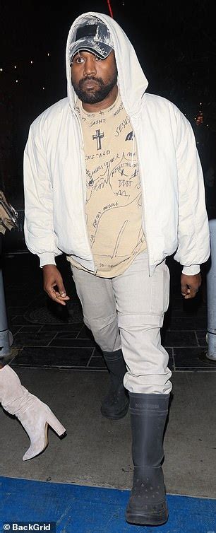 Kanye West Opts For A Low Key Look While Girlfriend Juliana Nalu Displays Her Taut Abs For La