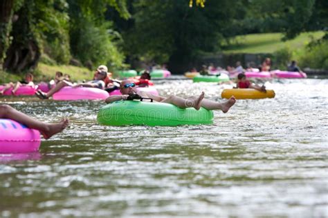 Dozens Of People Enjoy Tubing Down North Georgia River Editorial Photo