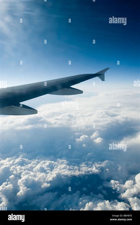 View of clouds from airplane window Stock Photo - Alamy