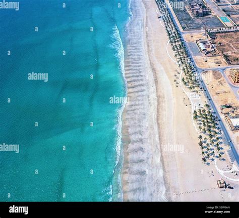 Al Dhariz beach in Salalah city in Dhofar region. Long clean natural ...