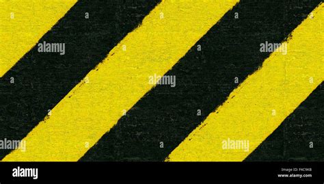 Warning black and yellow hazard stripes texture Stock Photo - Alamy