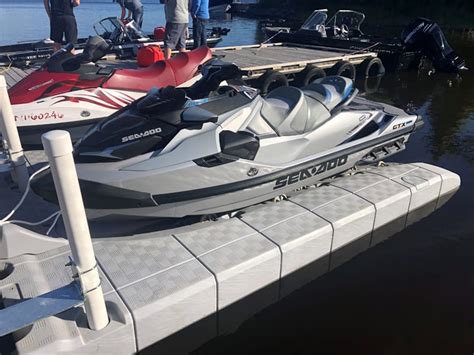 JetROLL Roll On Jet Ski Floating Dock Connects To A Fixed Structure