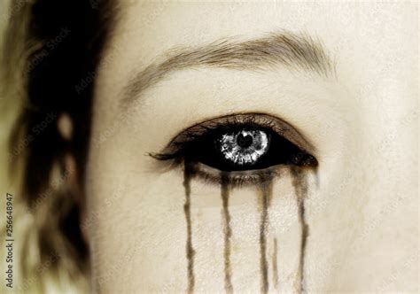 Evil black alien vampire or zombie eyes. Close up shot Stock Photo ...