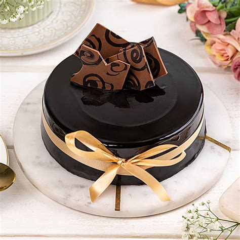 Buy Send Decorated Chocolate Truffle Cake Half Kg Eggless Online FNP