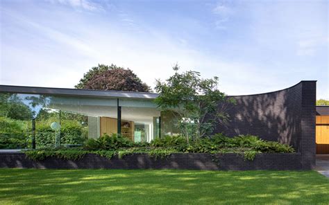 Black Brick House Designs That Are Awe-Inspiring - Gessato