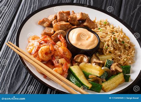 Japanese Hibachi Recipe Of Rice Shrimp Steak And Vegetables Served