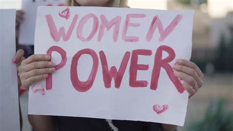 Camera Moves Along Feminist Banners In Stock Footage SBV 338663324