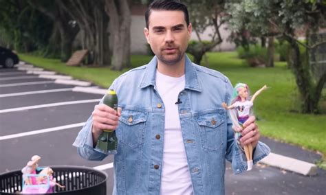 Ben Shapiro sets fire to Barbie dolls in pitiful movie protest