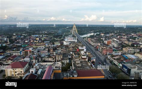 Aerial view of Siak Bridge IV (Abdul Jalil Alamuddin Syah Bridge) above Siak River (Sungai Siak ...