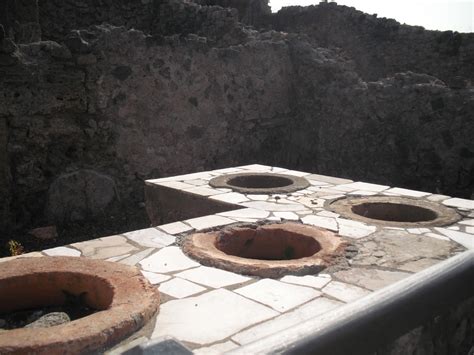 Pompeii Then And Now: A Thermopolium counter in Pompeii: Holes are ...