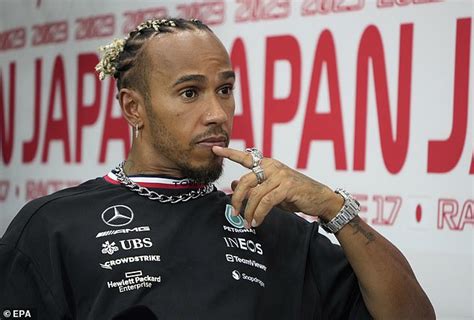 Lewis Hamilton Wears A Gold Tooth Grill As Fashion Loving Formula One