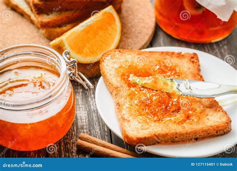 Close Up Of Toast With Homemade Orange Jam On A Table Stock Image