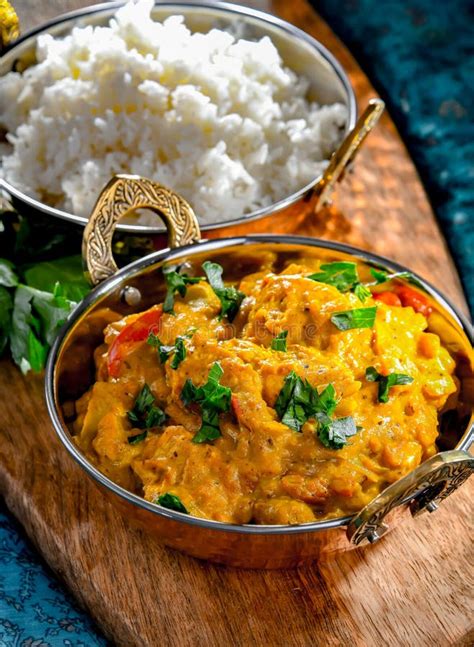 Curry Chicken With Rice Served In Original Indian Karahi Pots Stock