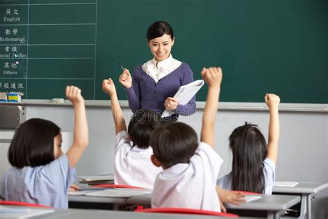 Teacher with Students in Chinese School Classroom Stock Photo - Image ...