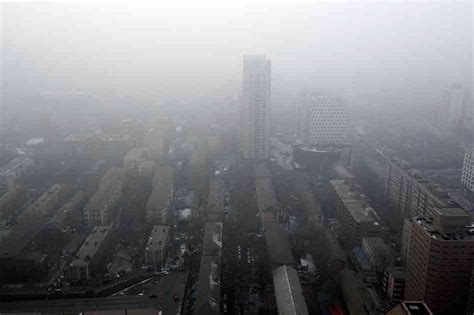 The Suffocating Smog Of Beijing In 19 Staggering Pictures