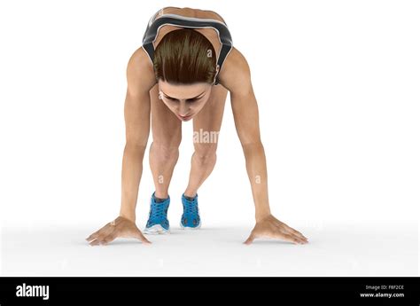 Athletic Woman In Crouched Starting Position Ready To Start Race