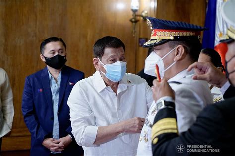 President Rodrigo Roa Duterte Pins The Rank Insignia On Newly Promoted