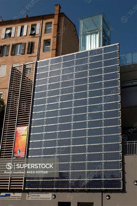 facade photovoltaic panels   building superstock