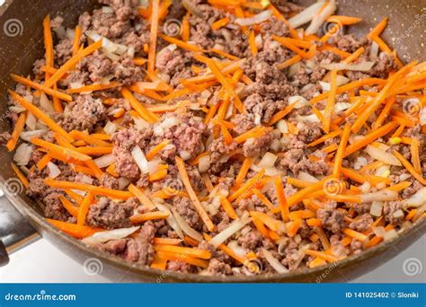 Fried The Minced Meat Onion And Carrot On Frying Pan Stock Photo