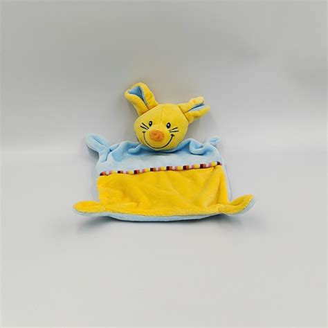 Doudou Plat Souris Bleu Jaune NICOTOY