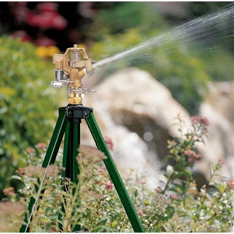 Orbit 5000 Sq Ft Impulse Tripod Lawn Sprinkler In The Lawn Sprinklers