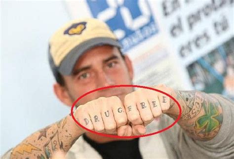 CM Punk’s 51 Tattoos & Their Meanings – Body Art Guru