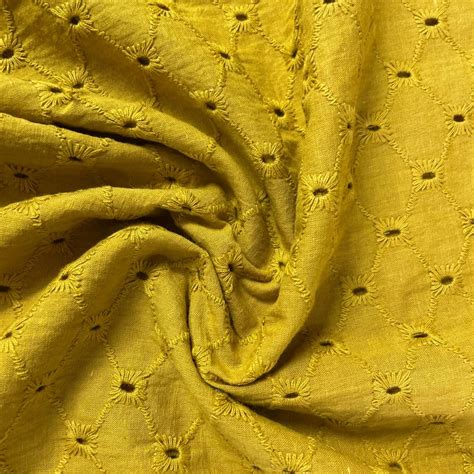 Exclusive Cotton Schiffli Mustard Yellow Floral Embroidery Fabric At Rs