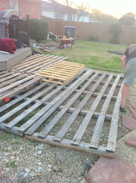 Build A Wooden Pallet Deck For Under 300 Pallet Decking Pallet