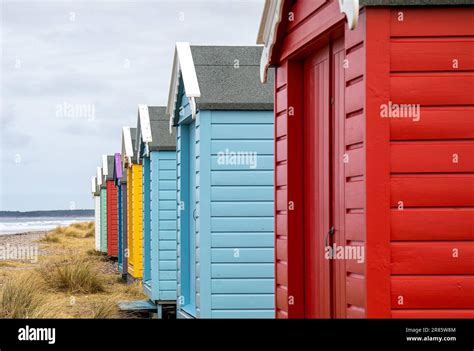 The Colorful Beach Huts By The Sea Stock Photo Alamy