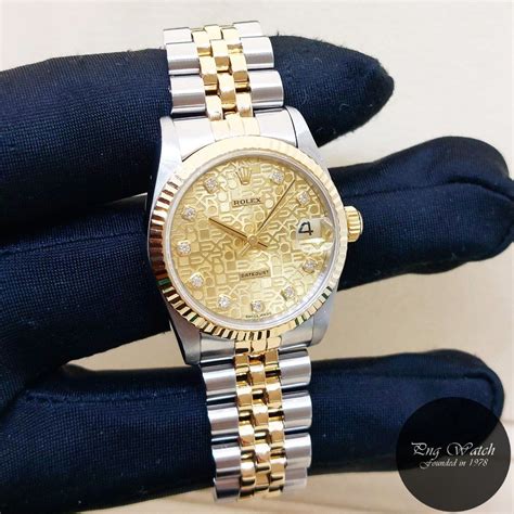 Rolex 31mm Fluted Bezel Stainless Steel Casing 18K Half Yellow Gold