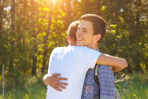 Male Friends Hugging