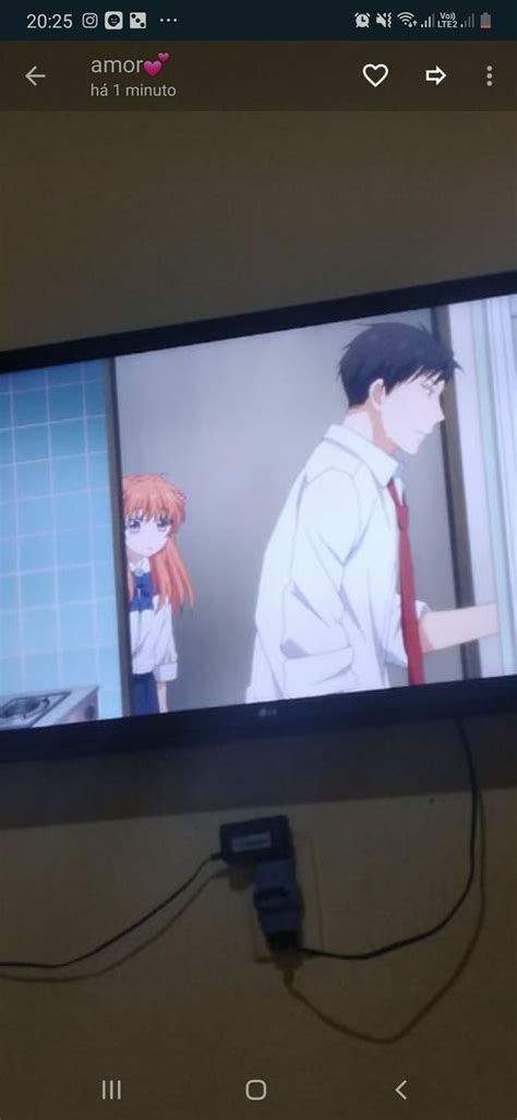 A Tv Screen With Two Anime Characters On It S Side And An Electrical