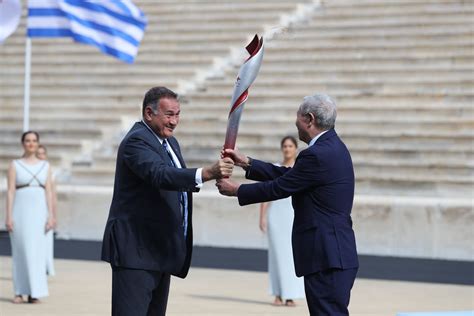 Greece Hands Over Olympic Flame To Beijing Organizers