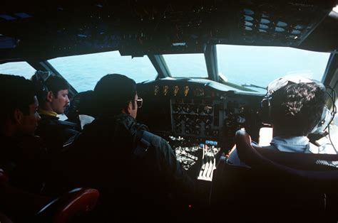 A view of the crew inside the cockpit of a P-3C Orion aircraft of ...