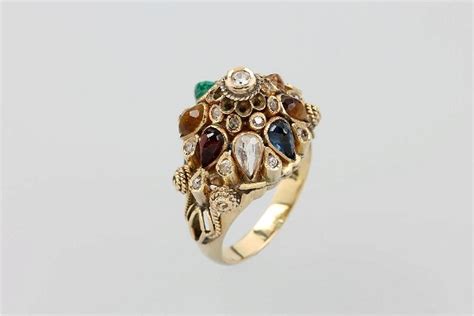 18 Kt Gold Wedding Ring With Gem Stones