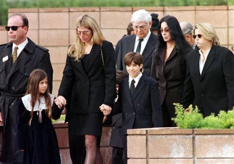 Family members of Sonny Bono walk to the grave sit Pictures | Getty Images