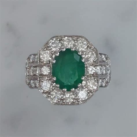 Vintage Emerald and Diamond Cluster Ring - Jewellery Discovery