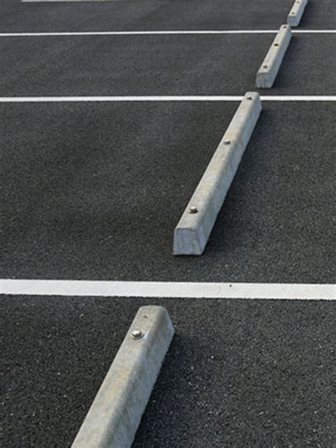 Parking Lot Bumpers | Prestige Striping LLC