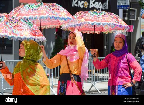 The Participants In Traditional Filipino Outfits Marching In The