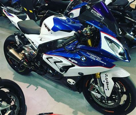 Several Motorcycles Are Lined Up In A Showroom