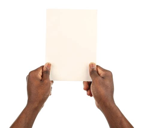 Premium Photo Male Hands Holding Sheet Of Paper Isolated On White