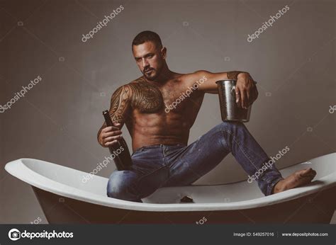 Sexy Man On Bathtub With Champagne Celebrating Gay Christmas Or Birthday Private Sex Party