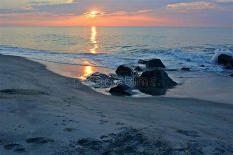 Beautiful Beach Sunrise With Golden Skies Stock Image Image Of