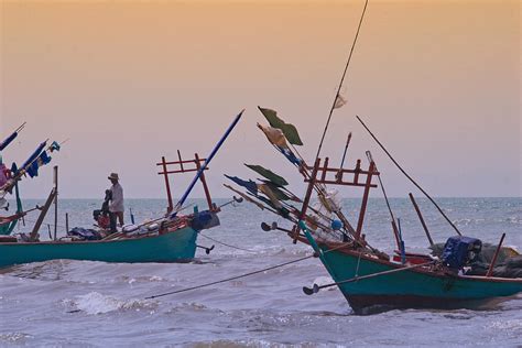 Fishing in South China Sea Photograph by Beverly Hutchman - Pixels